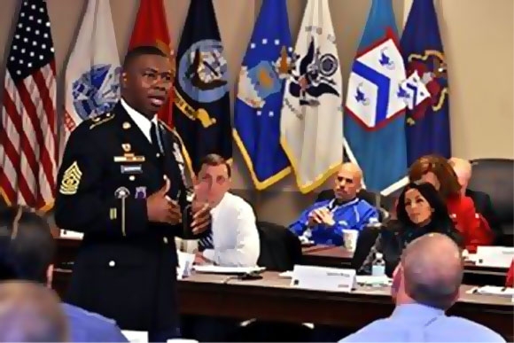 Command Sgt. Maj. Willie Clemmons, U.S. Army Recruiting Command, talks about the Army core values as he addresses National Association of Secondary School Principals and U.S. Army Leadership and Professional Development Symposium participants Nov. 13 at the Lewis and Clark Center. Photo by Prudence Siebert/Fort Leavenworth Lamp 
