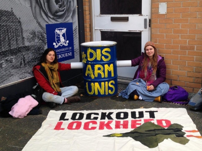 Student activists blockade a door at the University of Melbourne